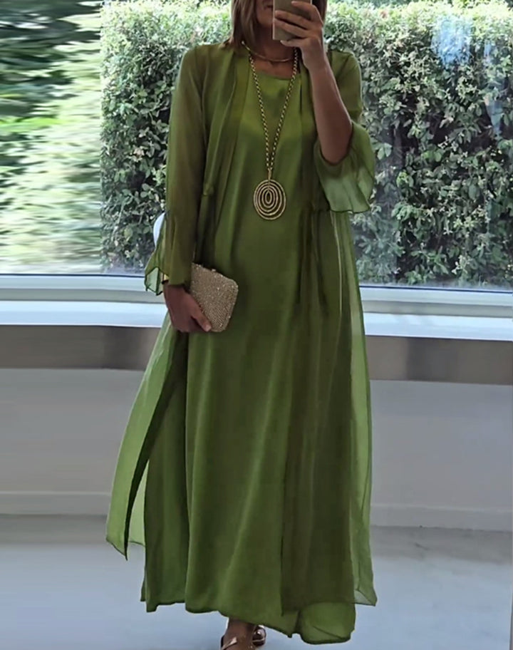 Women's double-layer evening maxi dress with transparent overlay, sleek inner dress, waist ties, and trumpet sleeves Mune Fashion