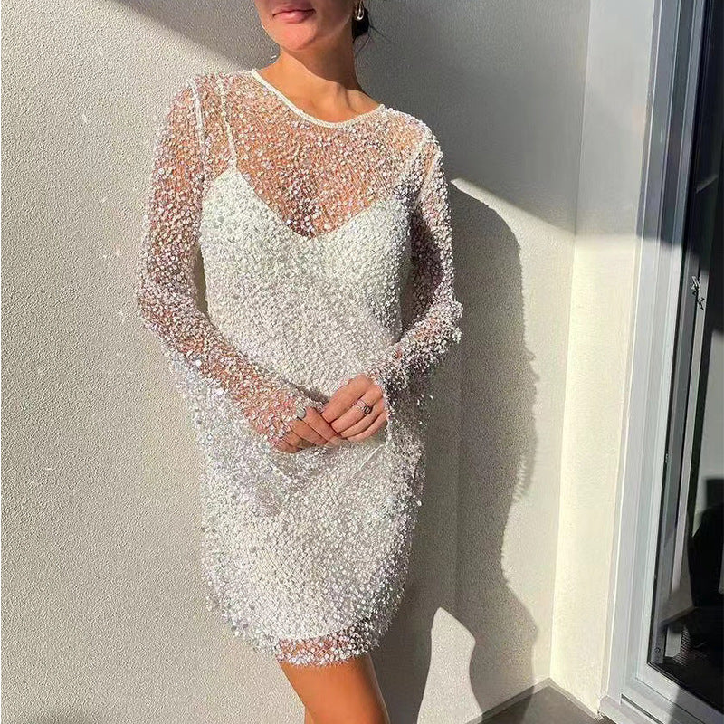 Ladies Glittering Cocktail Dress with Shimmering Sequins and Long Sleeves Mune