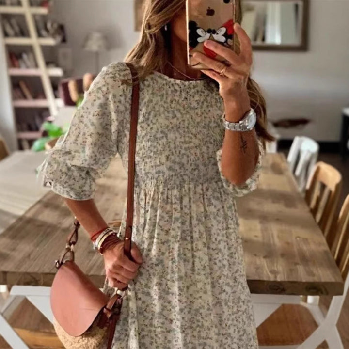 Women nan locker falling babydoll midi dress with gathered under bust, dropped three-quarter sleeves and fine floral print Mune Fashion