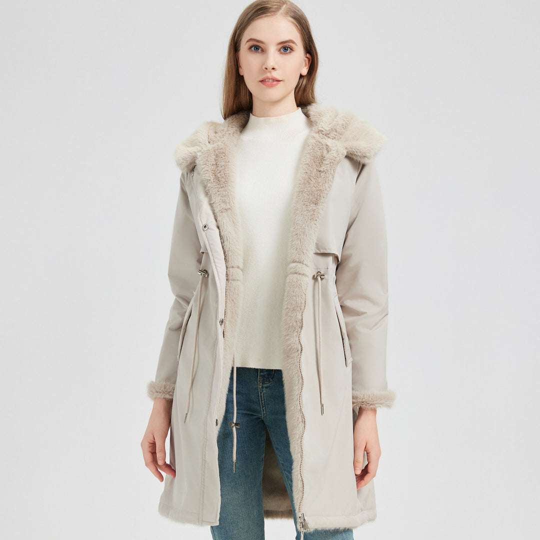 Women's tailored long thermal parka with faux fur trim on hood and sleeves as well as drawstring waist Mune Fashion