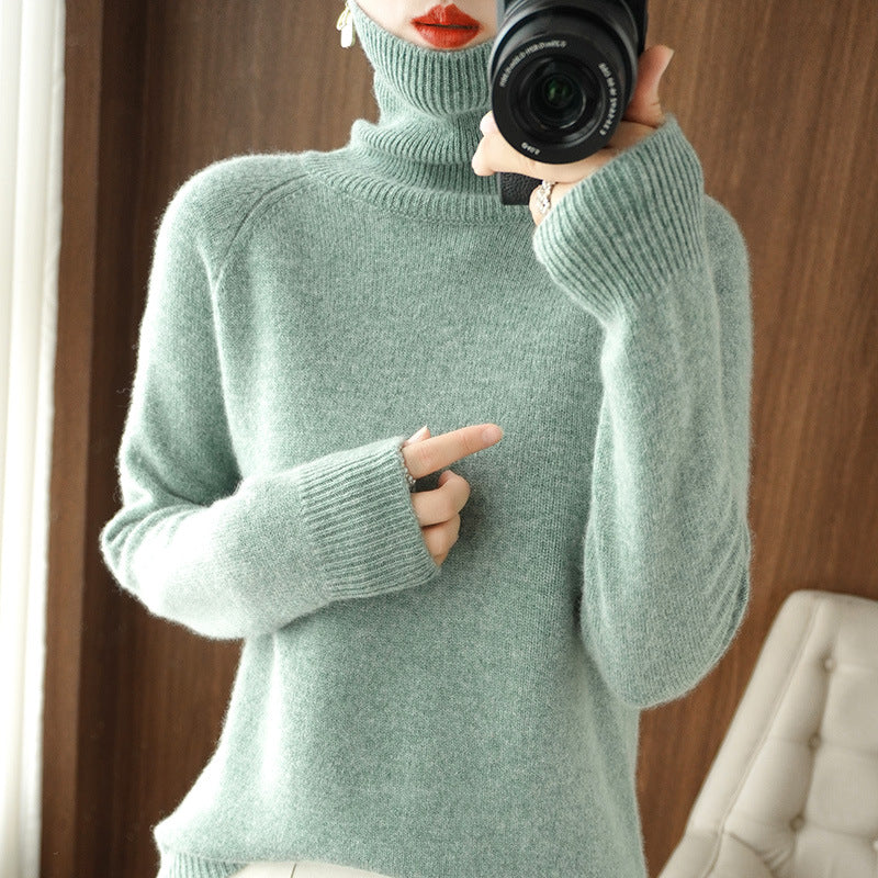 Women's turtleneck sweater made of soft wool blend with extended cuffs Mune Fashion