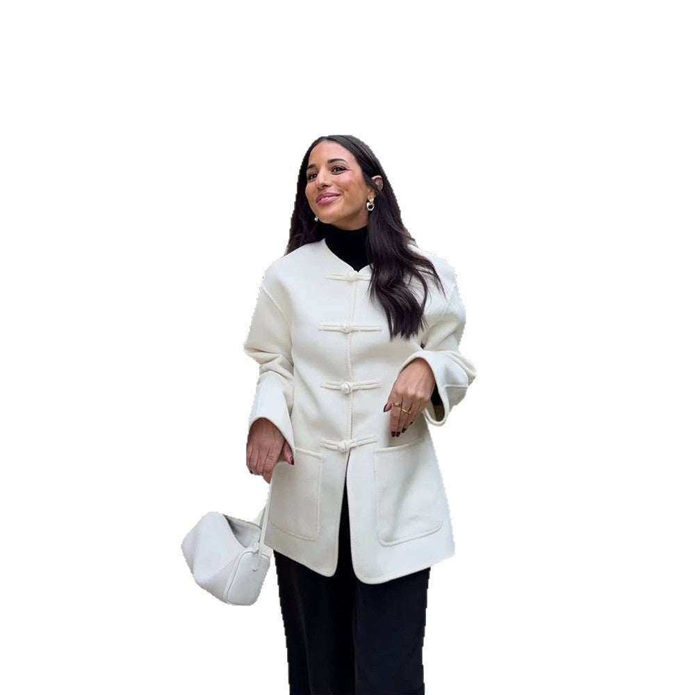 Women's short coat with Chinese toggle closures, oversized sleeves, and patch pockets Mune Fashion