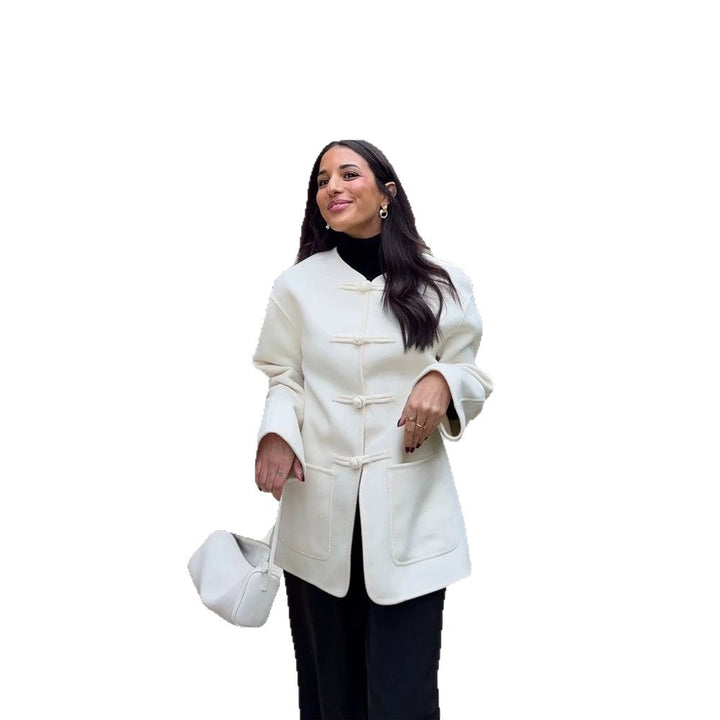 Women's short coat with Chinese toggle closures, oversized sleeves, and patch pockets Mune Fashion