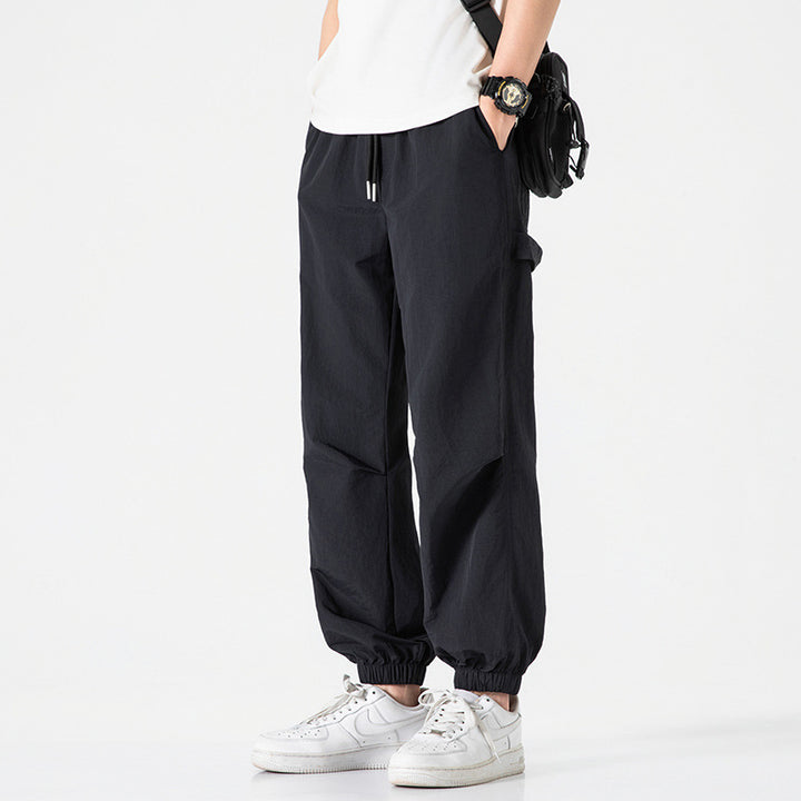 Men's Nylon-Mix Relaxed Jogger with elastic comfort waistband, concealed zipper pockets, and ribbed ankle cuffs Mune Fashion