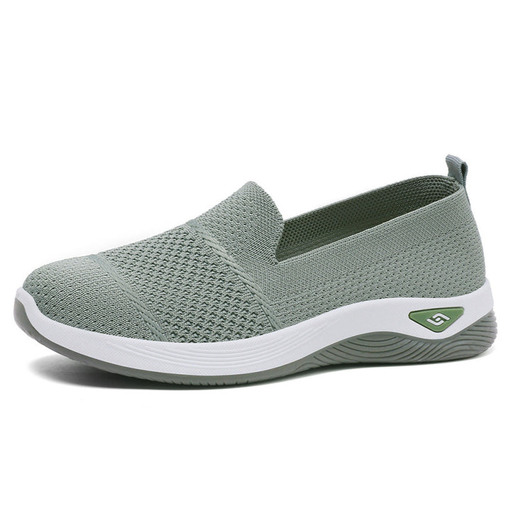 Ladies' knitted slip-on comfort sneakers with sock-like fit, breathable knitted upper, and shock-absorbing EVA midsole Mune Fashion