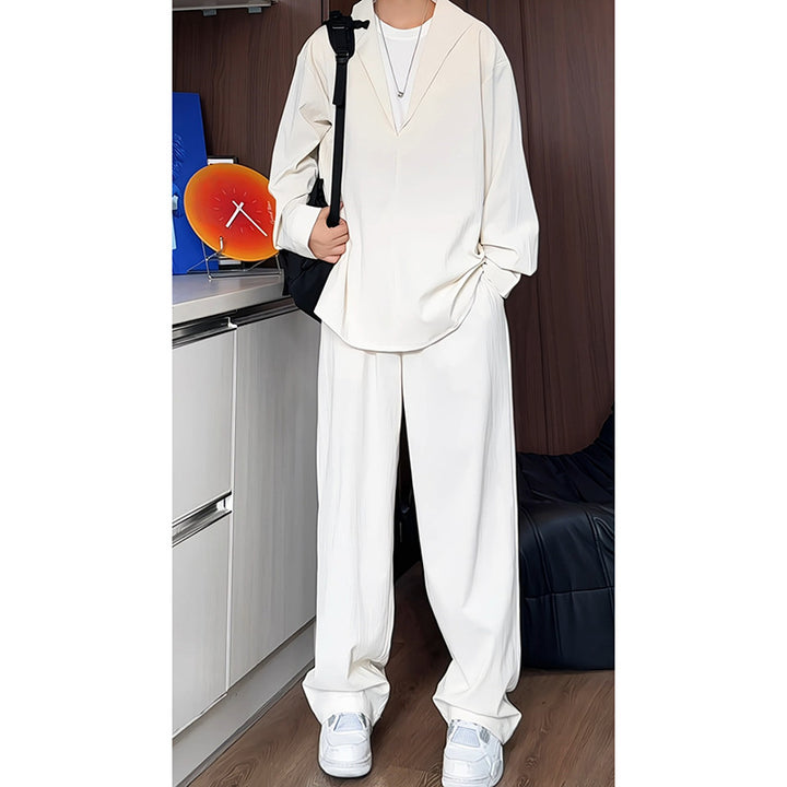 Men's loosely cut two-piece leisure set with deep V-neck overshirt and wide pleated trousers Mune Fashion