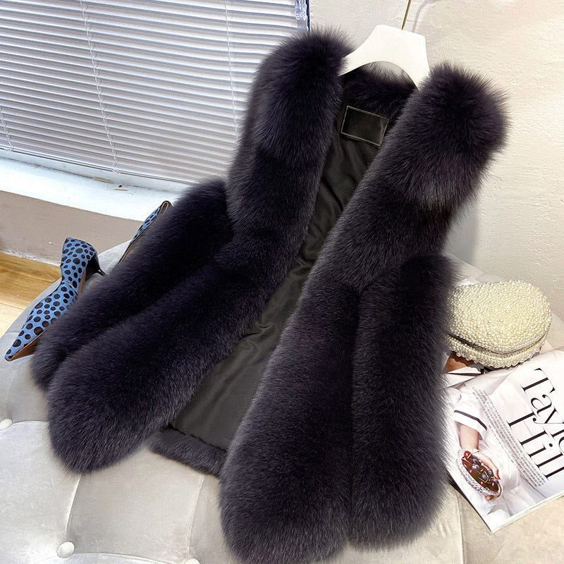 Ladies faux fur vest with long pile fur, waist-length A-line and padded inner finish Mune Fashion