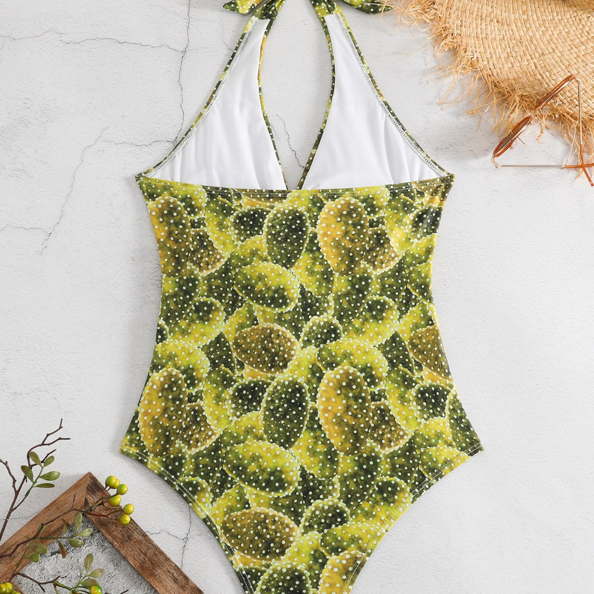 Women's one-piece swimsuit with playful knot design and floral pattern Mune Fashion