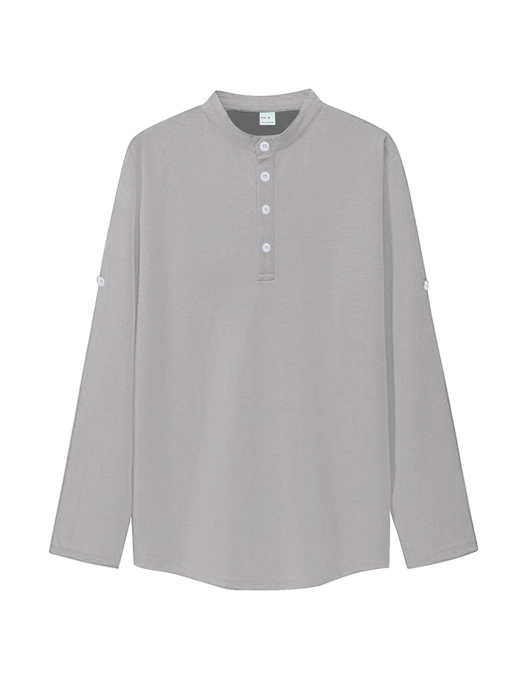 Women's oversized long sleeve Henley with stand-up collar waffle texture and sleeve fastening Mune Fashion