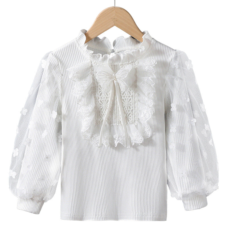 Girl ruffled blouse with floral appliqués and transparent sleeves Mune Fashion