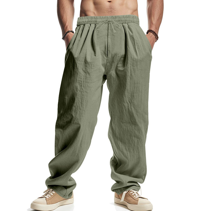 Men's loose leisure pants with elastic waistband, drawstring, and deep side pockets Mune Fashion