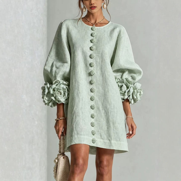 Women’s midi dress with voluminous puff sleeves, 3D flower button placket and linen texture Mune Fashion
