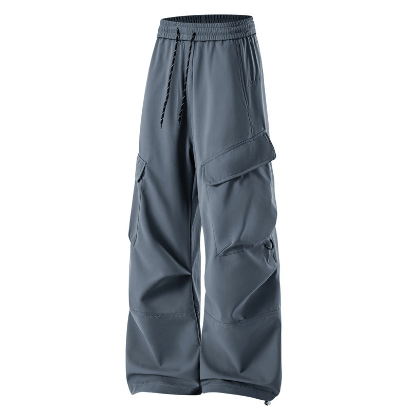 Men's loose-fitting utility cargo pants with elastic waistband, drawstring, and generous flap pockets Mune Fashion