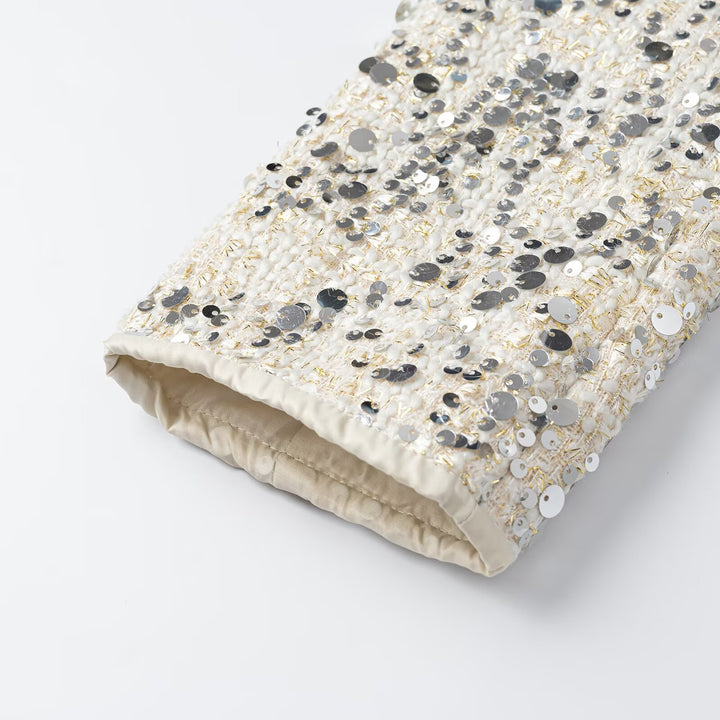 Women's short jacket made of bouclé with sequin trim, decorative pearl buttons, and a belted waist Mune Fashion
