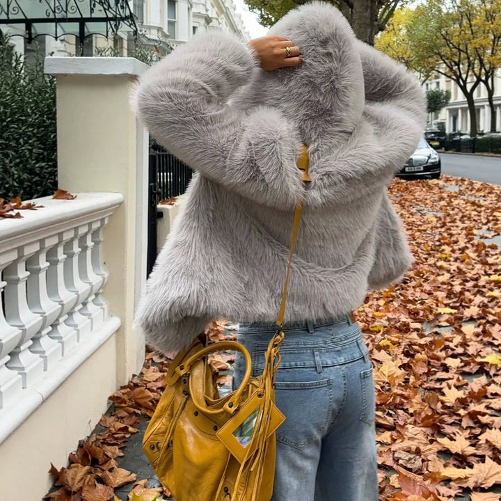 Women's short blazer made of long-fiber shaggy faux fur with high shawl collar and clear boxy silhouette Mune Fashion