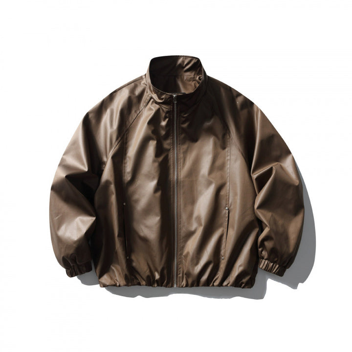 Men's short cut faux leather bomber jacket with stand-up collar, raglan sleeves, and elastic hem Mune Fashion