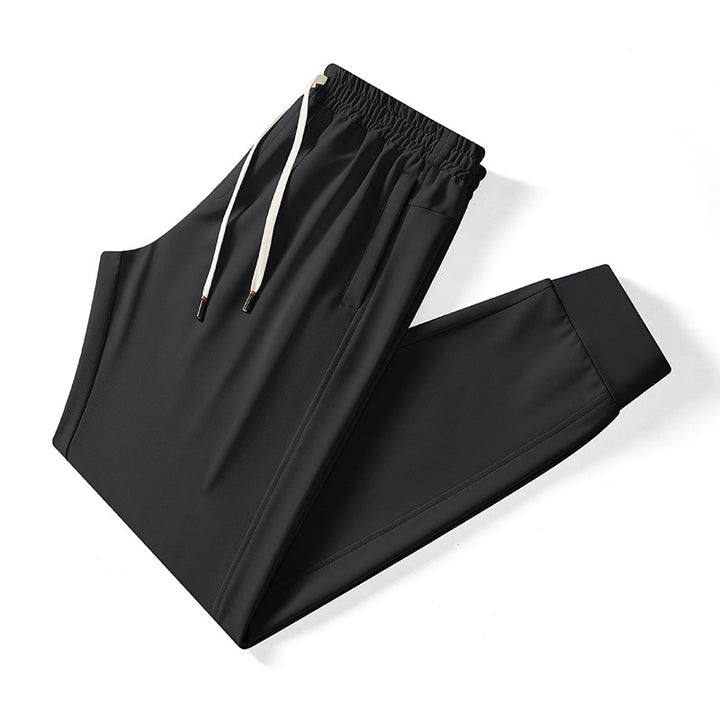 Men's Tech Jogging Pants with elastic drawstring waistband, concealed zipper pockets, and tailored ankle cuffs Mune Fashion