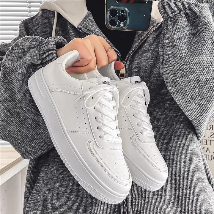 Unisex minimalist Low-Top court sneaker with perforated upper material, padded heel collar and shock-absorbing sole Mune Fashion