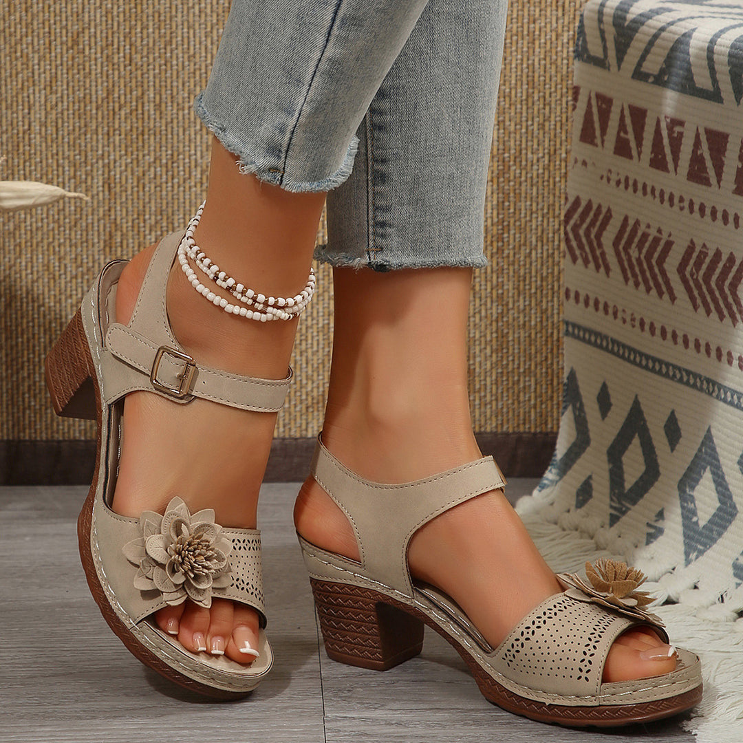 Women's sandal with medium-high block heel, flower appliqué, and adjustable ankle strap Mune Fashion