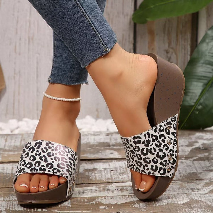 Women's wedge sandals with wide strap, stud accent, and ergonomic wedge sole Mune Fashion