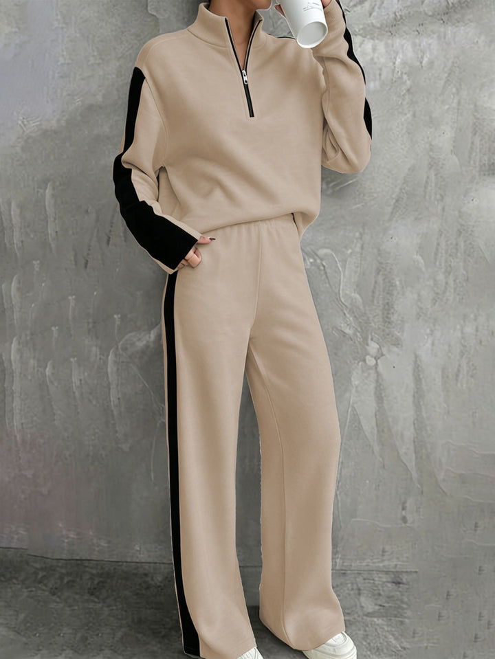Women's casual tracksuit set with half zip, elastic waistband and side contrast stripes Mune Fashion