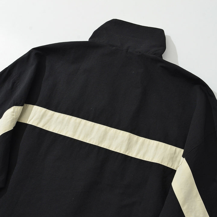 Women's sporty track jacket with high stand-up collar and contrasting stripes Mune Fashion