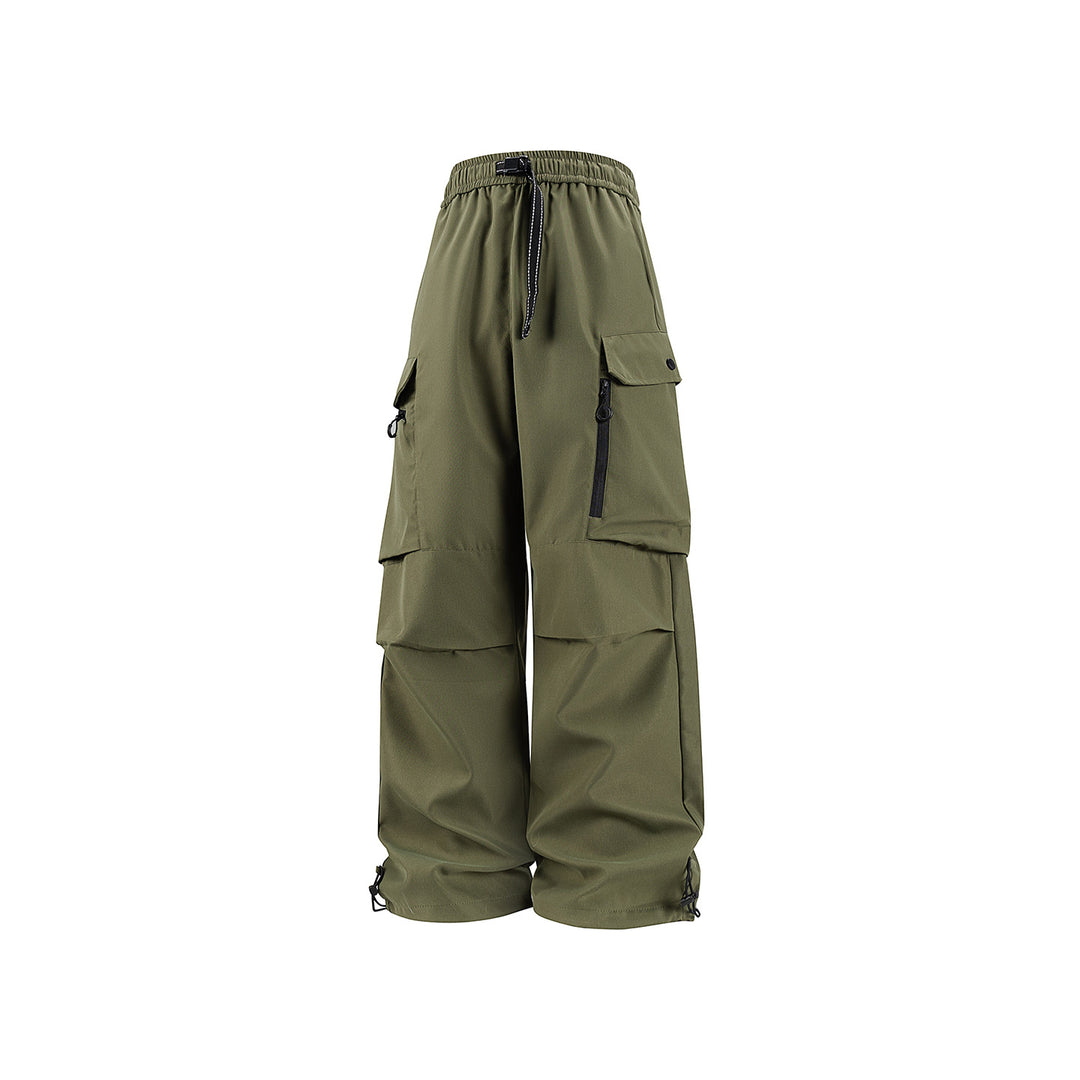 Unisex Wide technical cargo pants with multi-function pockets, drawstring and adjustable leg hems Drune
