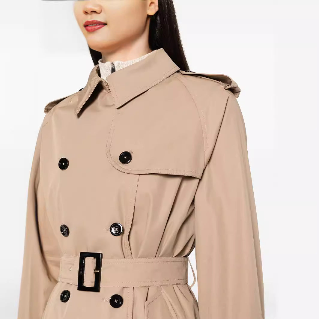 Women's trench coat in maxi length with double-breasted button placket and waist belt Mune Fashion