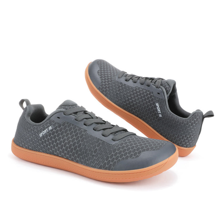 Men's low city sneakers with perforated mesh upper material, reinforced toe cap, and flexible outsole Mune Fashion