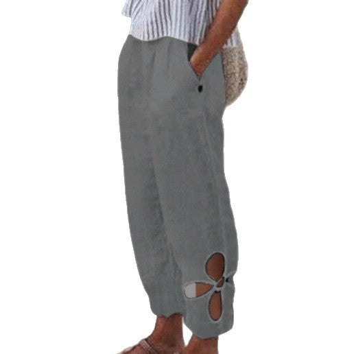 Women's light summer pants with elastic waistband, gathered ankle, and flower-shaped cutout Mune Fashion