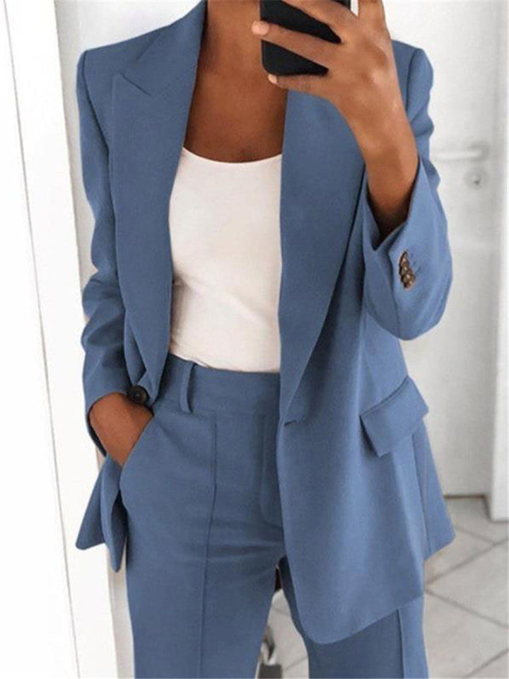 Women’s office-appropriate pantsuit set with wide trousers and tailored blazer Mune Fashion