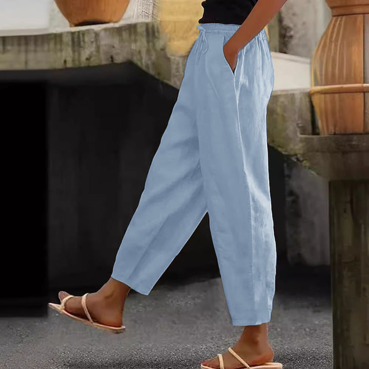 Women's loose-fitting linen blend pants with elastic waistband, drawstring, and angled side pockets Mune Fashion