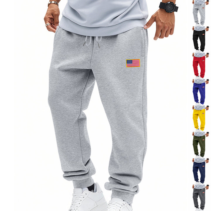 Men's slim-fit sweatpants with tapered leg, elastic drawstring waistband, and discreet flag application Mune Fashion