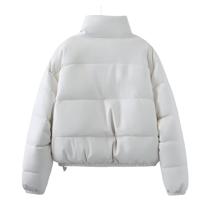 Women short-cut quilted jacket with high stand-up collar, snap button closure and elastic hem Mune Fashion