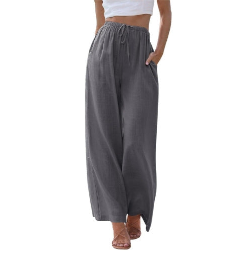 Women's wide linen pants with elastic waistband, drawstring, and side pockets Mune Fashion