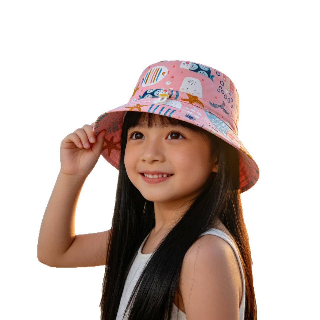 Unisex children's sun hat with reversible design, chin strap, and high UV protection Mune Fashion