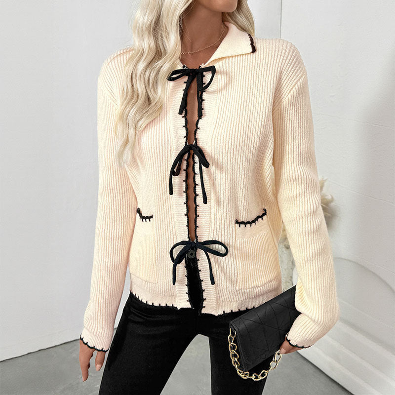 Ladies fine knit cardigan with decorative ribbon closure and contrast edges Mune Fashion