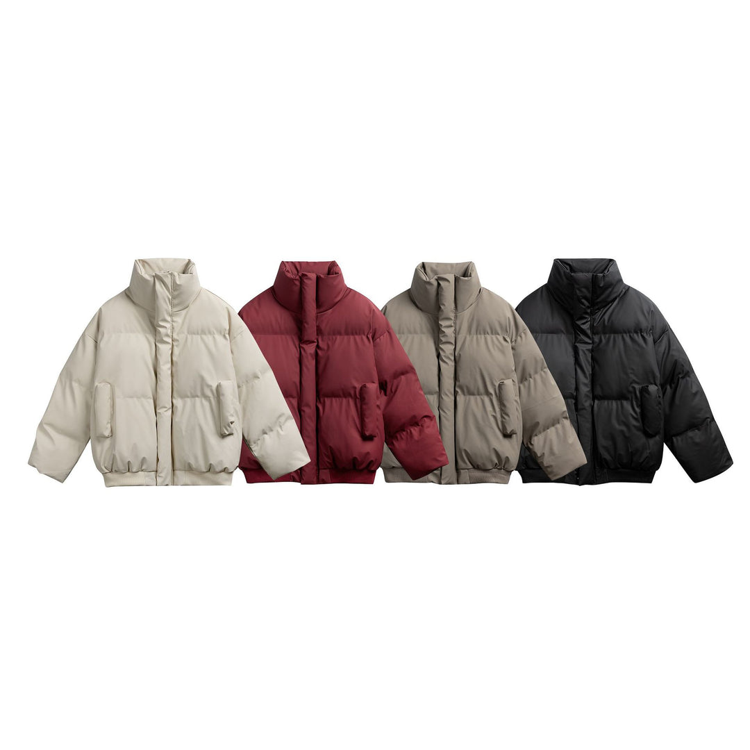 Women short-cut padded quilted bomber jacket with high stand-up collar and patch pockets Mune Fashion
