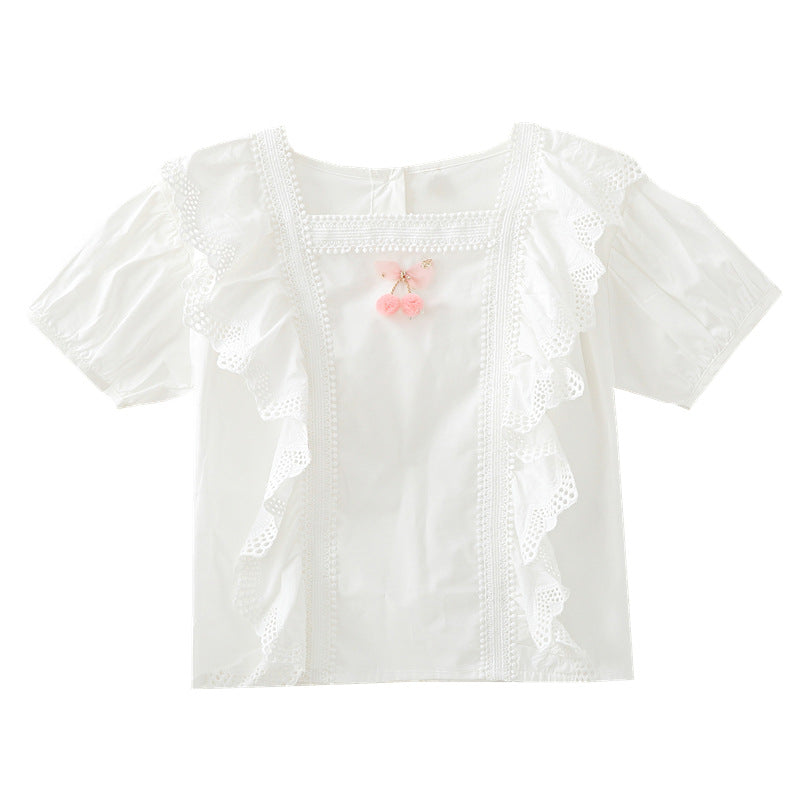 Girls blouse with playful ruffle design and artistic crochet decoration Mune Fashion