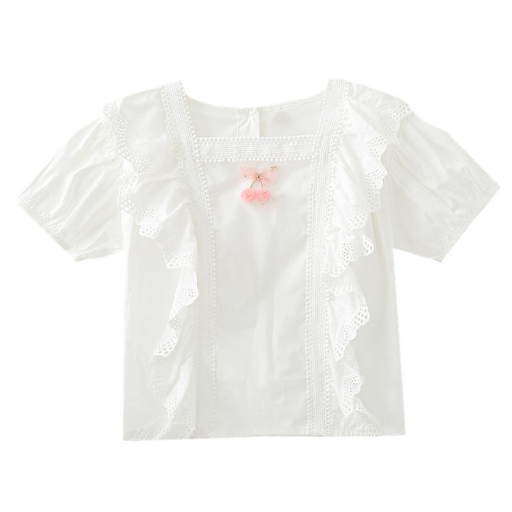 Girls blouse with playful ruffle design and artistic crochet decoration Mune Fashion