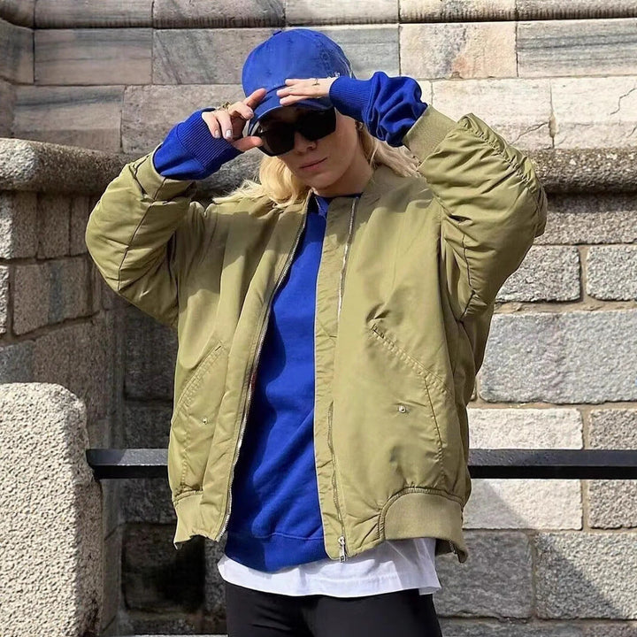Women's Oversized Bomber Jacket with Technical Details and Practical Pockets Mune