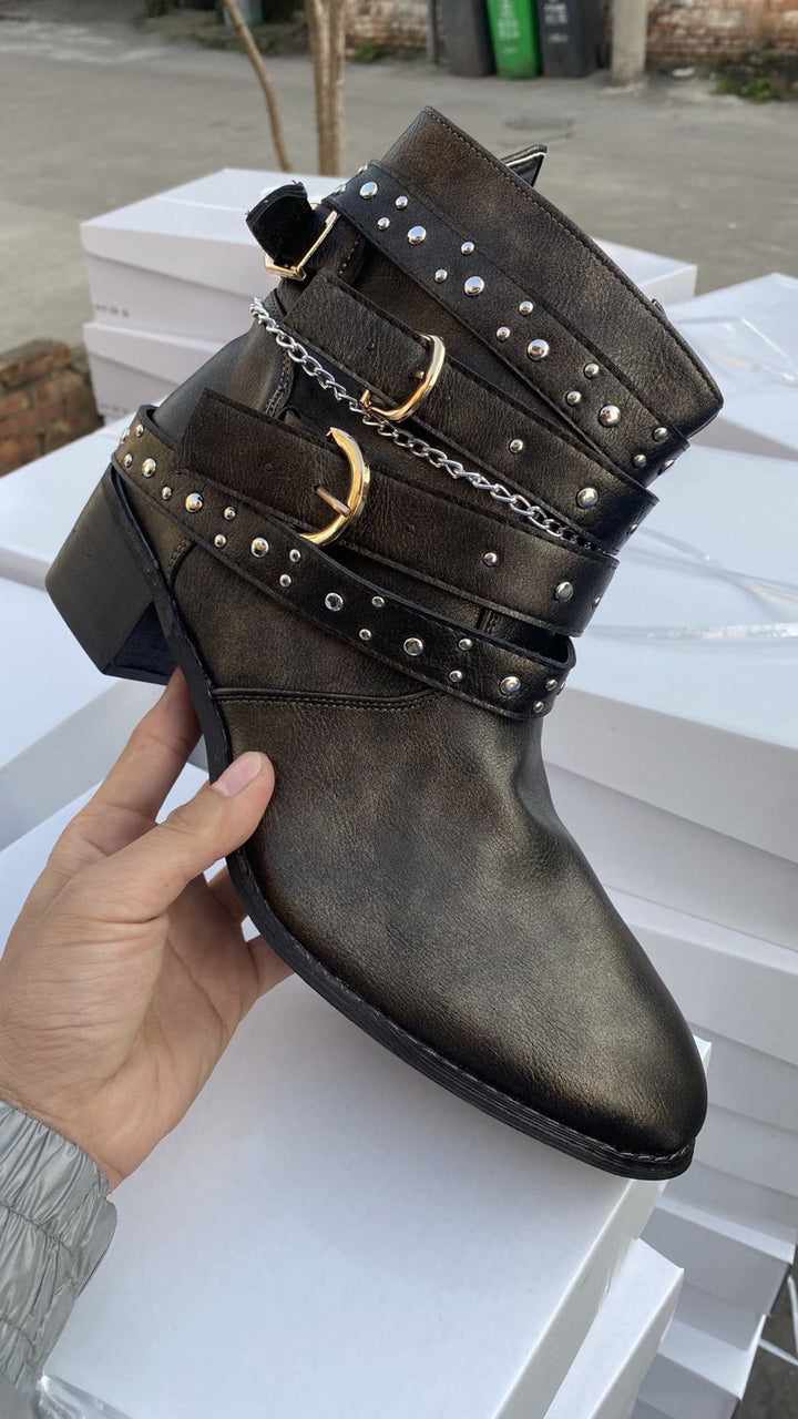 Women ankle-high biker ankle boots with multiple studded straps, decorative chains, and adjustable buckles Mune Fashion