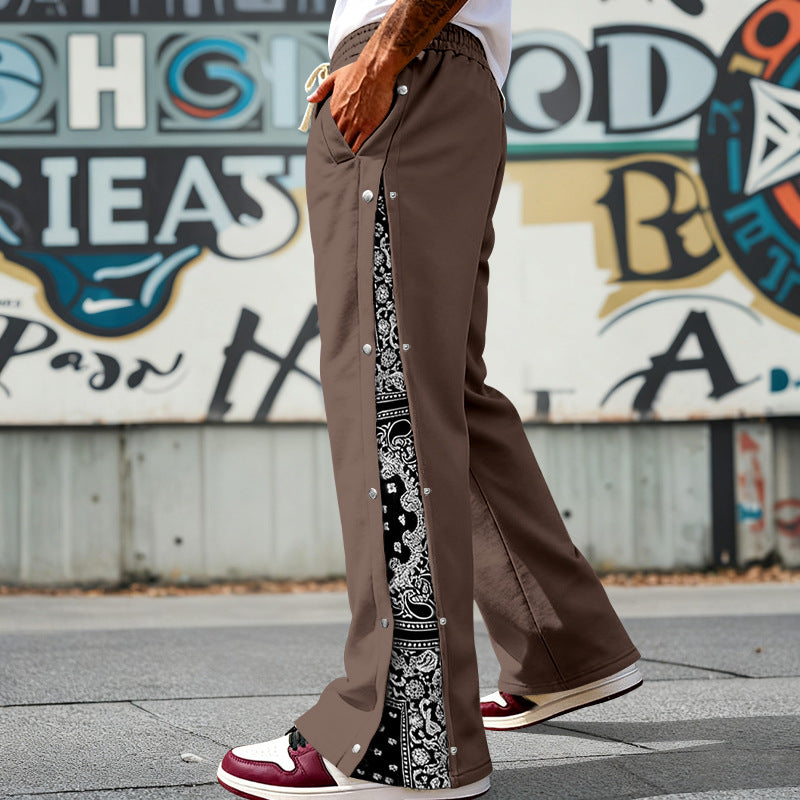 Men's loosely cut snap-front jogging pants with paisley side insert and elastic comfort waistband Mune Fashion
