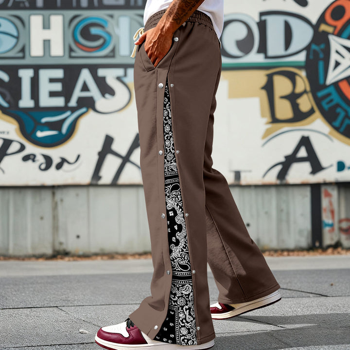 Men's loosely cut snap-front jogging pants with paisley side insert and elastic comfort waistband Mune Fashion