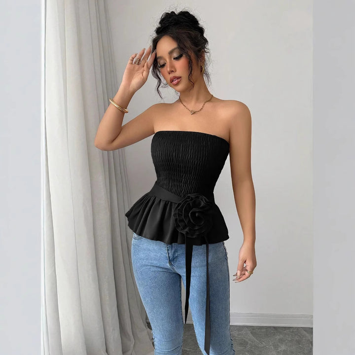 Women's fitted strapless Smok top with ruffle peplum and decorative fabric flower Mune Fashion