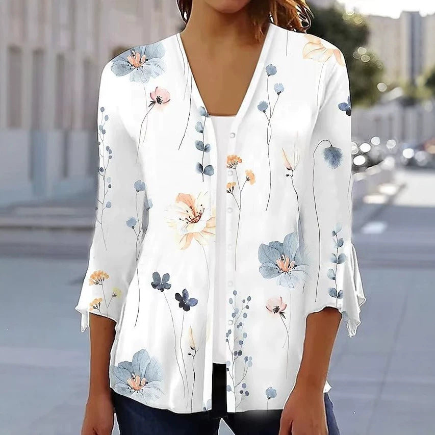 Women's light chiffon blouse with watercolor flower print, V-neck, button placket and three-quarter sleeves Mune Fashion
