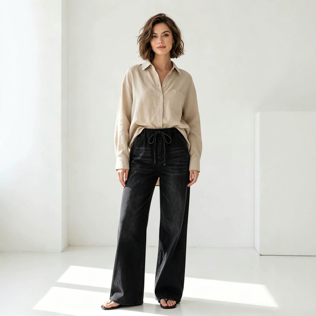 Women's Relaxed-Fit Denim Pants with elastic drawstring waistband, subtle used effect, and wide leg Mune Fashion