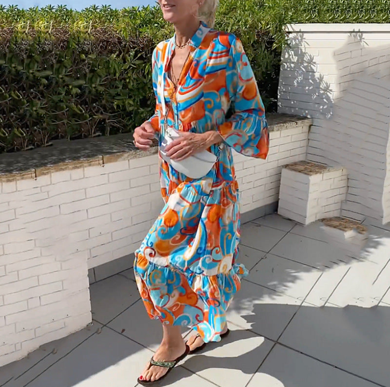 Women's airy maxi dress with watercolor print, V-neck, half button placket and tiered skirt Mune Fashion