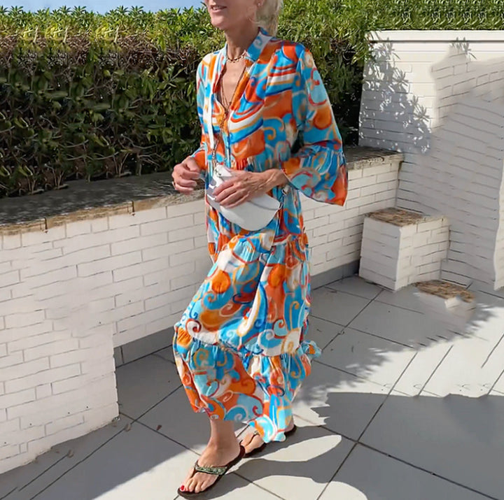 Women's airy maxi dress with watercolor print, V-neck, half button placket and tiered skirt Mune Fashion