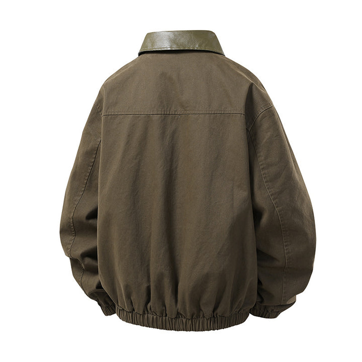 Men's Boxy Coach Jacket in minimalist layering style with contrasting faux leather collar, snap button closure & elastic hem Mune Fashion